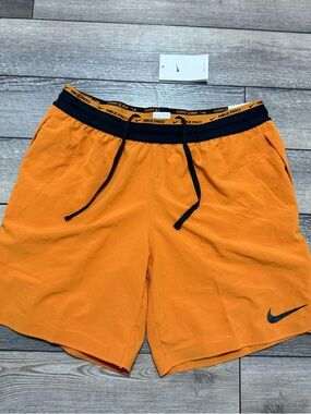 Nike Men’s Orange Athletic Training Shorts with Black Waistband